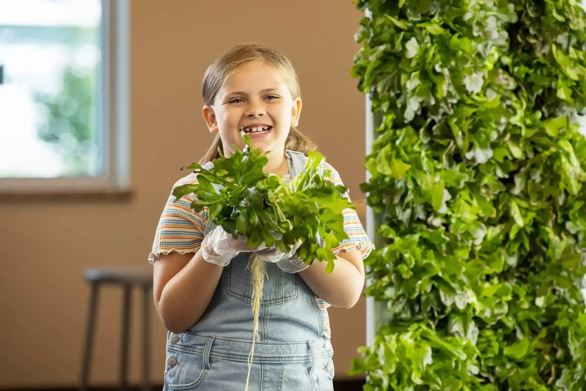 Kid Holding Harvest